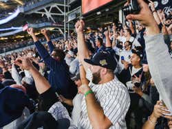 People celebrating a game at the Yankee Stadium